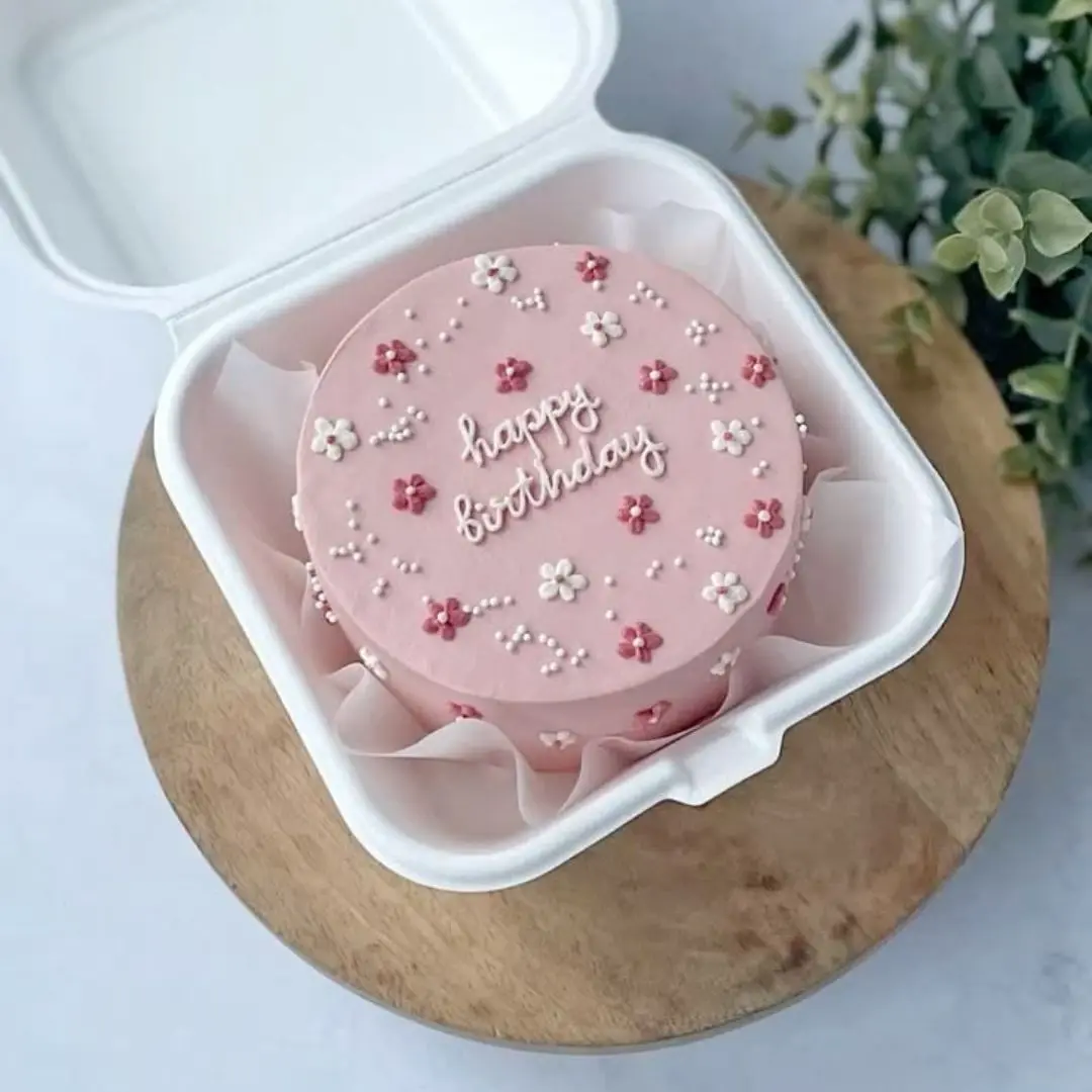 Cute bento cake crafted by a cake store in Thrissur
